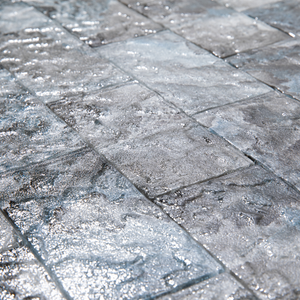 Glossy surface and straight edges.