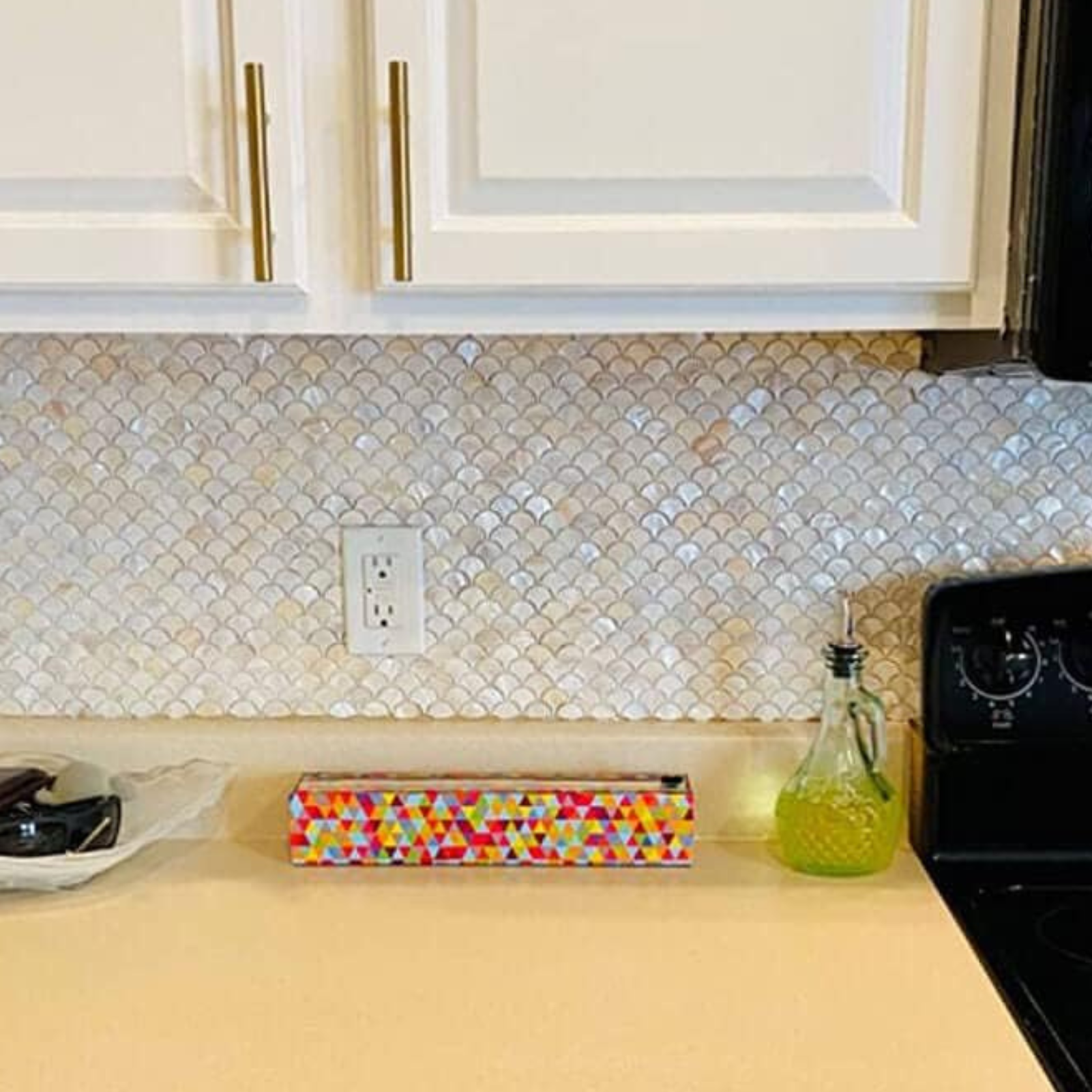 Each tile is a masterpiece of nature, showcasing a mesmerizing play of colors that evoke the shimmering depths of the ocean.