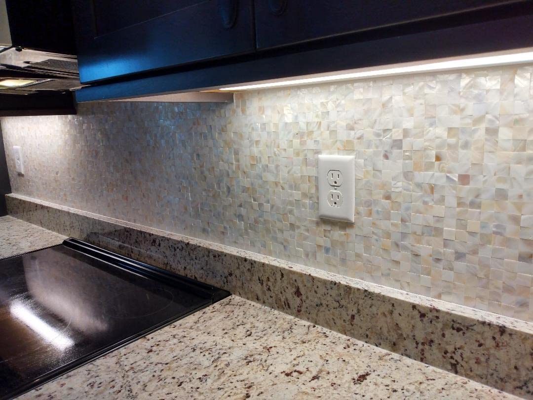 Diflart mother of pearl shell mosaic tiles bring maintaining a timeless exquisiteness to the space decorated.