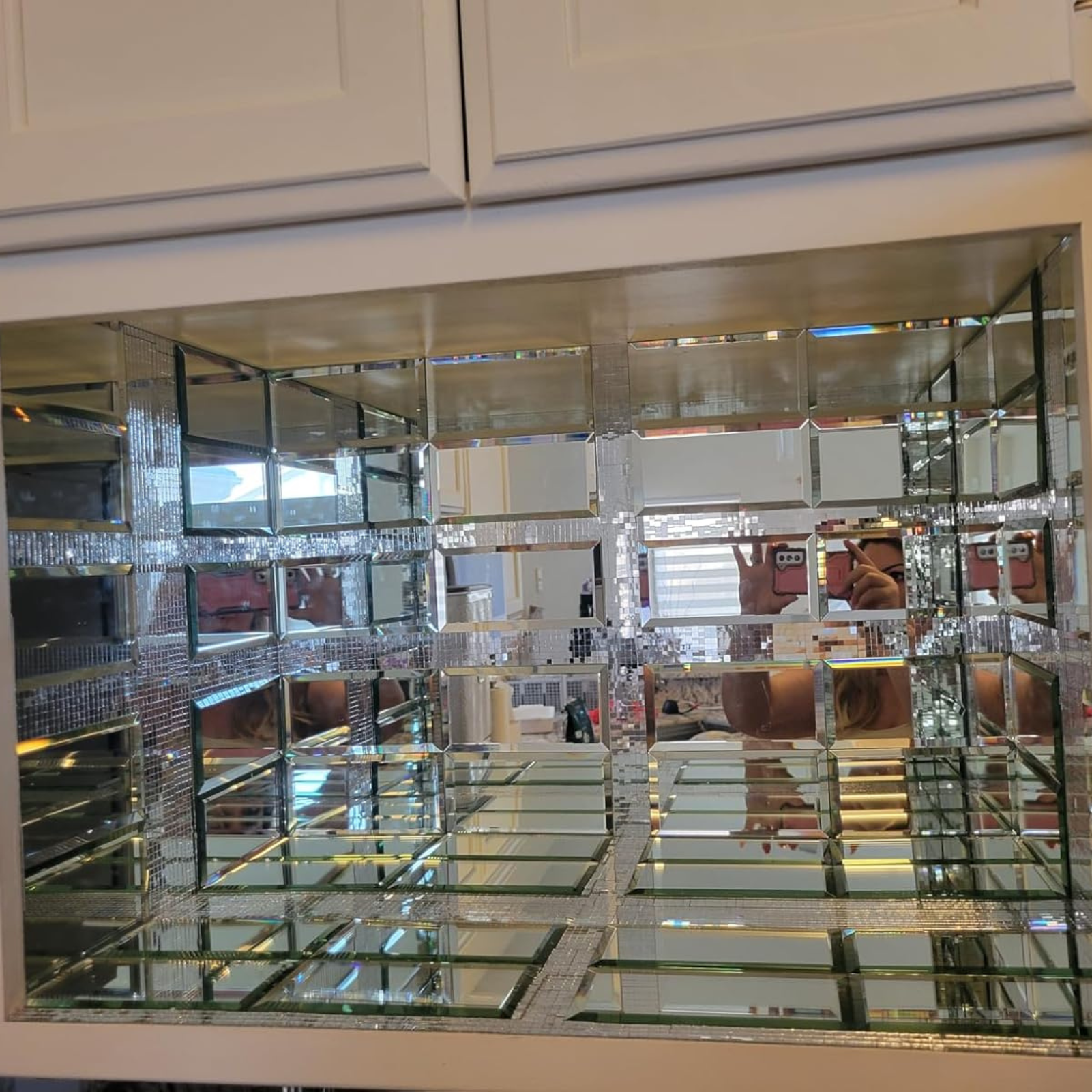 Step into a world of opulence and sophistication with mirror glass tiles.